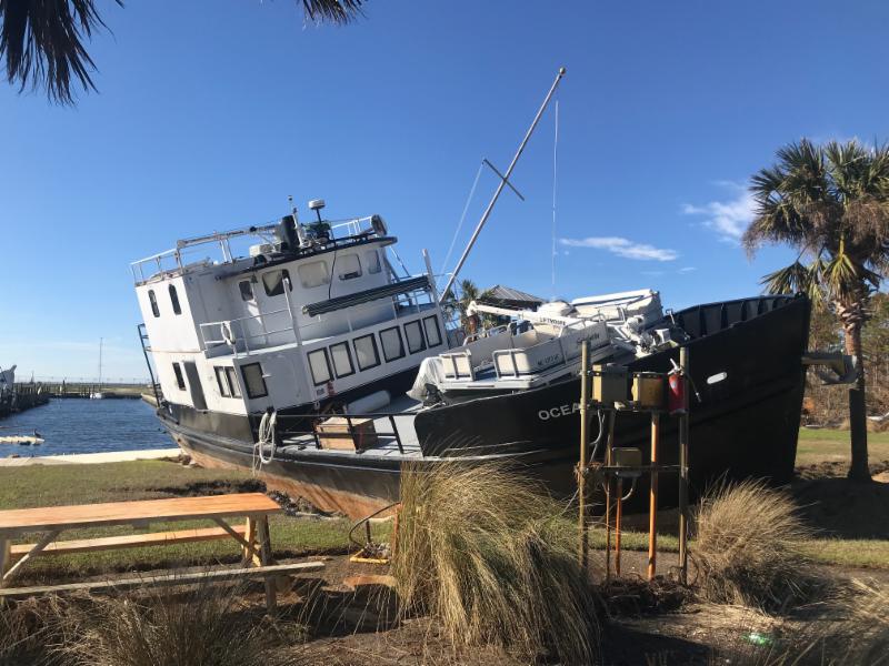 image of boat washed ashore