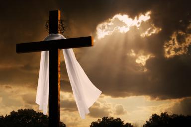 image of Dramatic Lighting on Christian Easter Cross As Storm Clouds Break